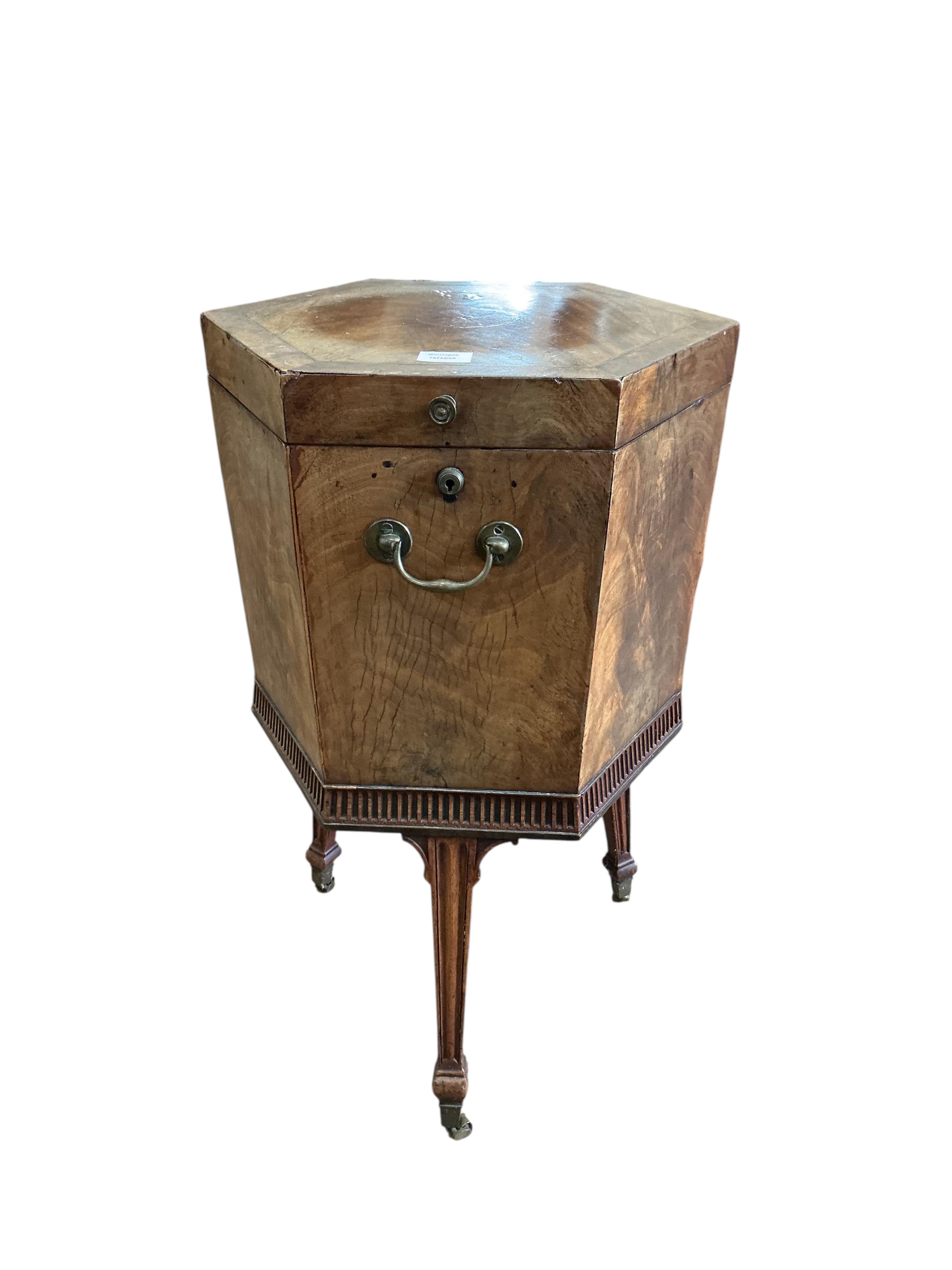 A George III inlaid mahogany hexagonal cellarette, width 47cm, height 75cm